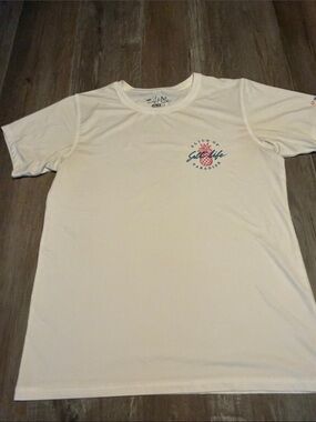 Salt Life SLX t-shirt features a "Slice of Paradise" pineapple graphic